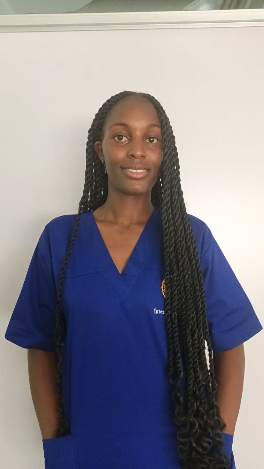 Passport photo of Ruth Nyamoita, caregiver in Thika Town, Nairobi